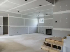 Barrie Ontario Drywall Experts – Reliable Home & Renovation Services Expert team completing taping and mudding on a large-scale ceiling and walls for a commercial or residential Drywall Barrie Ontario project.