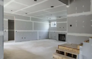 Barrie Ontario Drywall Experts – Reliable Home & Renovation Services Expert team completing taping and mudding on a large-scale ceiling and walls for a commercial or residential Drywall Barrie Ontario project.
