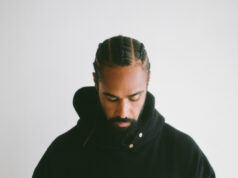 Fear of God Essentials Black Hoodie: Minimalism Meets Modern Streetwear Fear of God Essentials Black Hoodie: Minimalism Meets Modern Streetwear